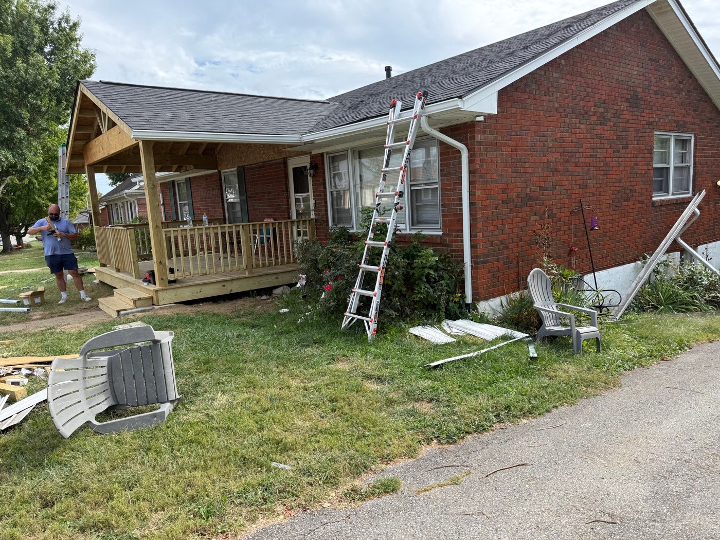 New wood porch addition on a brick home